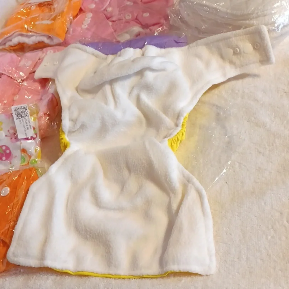 Diaper covers and liners 7 covers and 6 liners all new baby girl